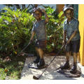 outdoor bronze children playing golf garden statues